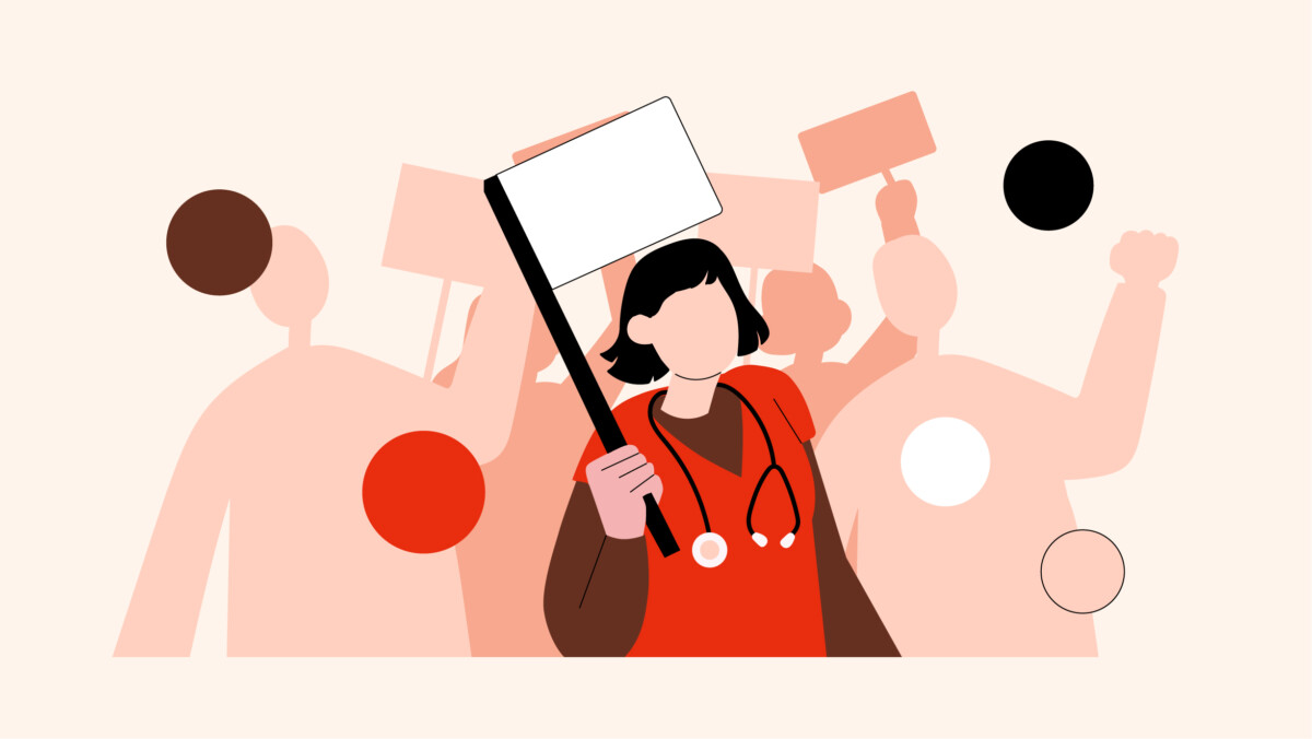 Illustration of a healthcare worker wearing a stethoscope and holding a blank protest sign, with silhouettes in the background—highlighting the ongoing UK junior doctors pay dispute.