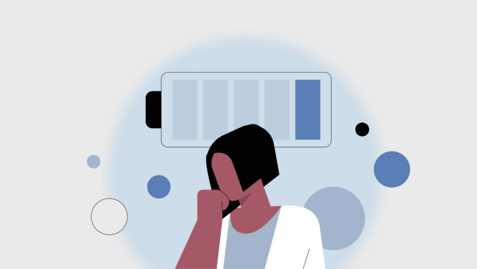 Illustration of a person with their head on a hand, looking tired. A nearly empty battery icon hovers above, surrounded by blue and black circles—mirroring the challenges of doctor burnout in an AI-driven world.